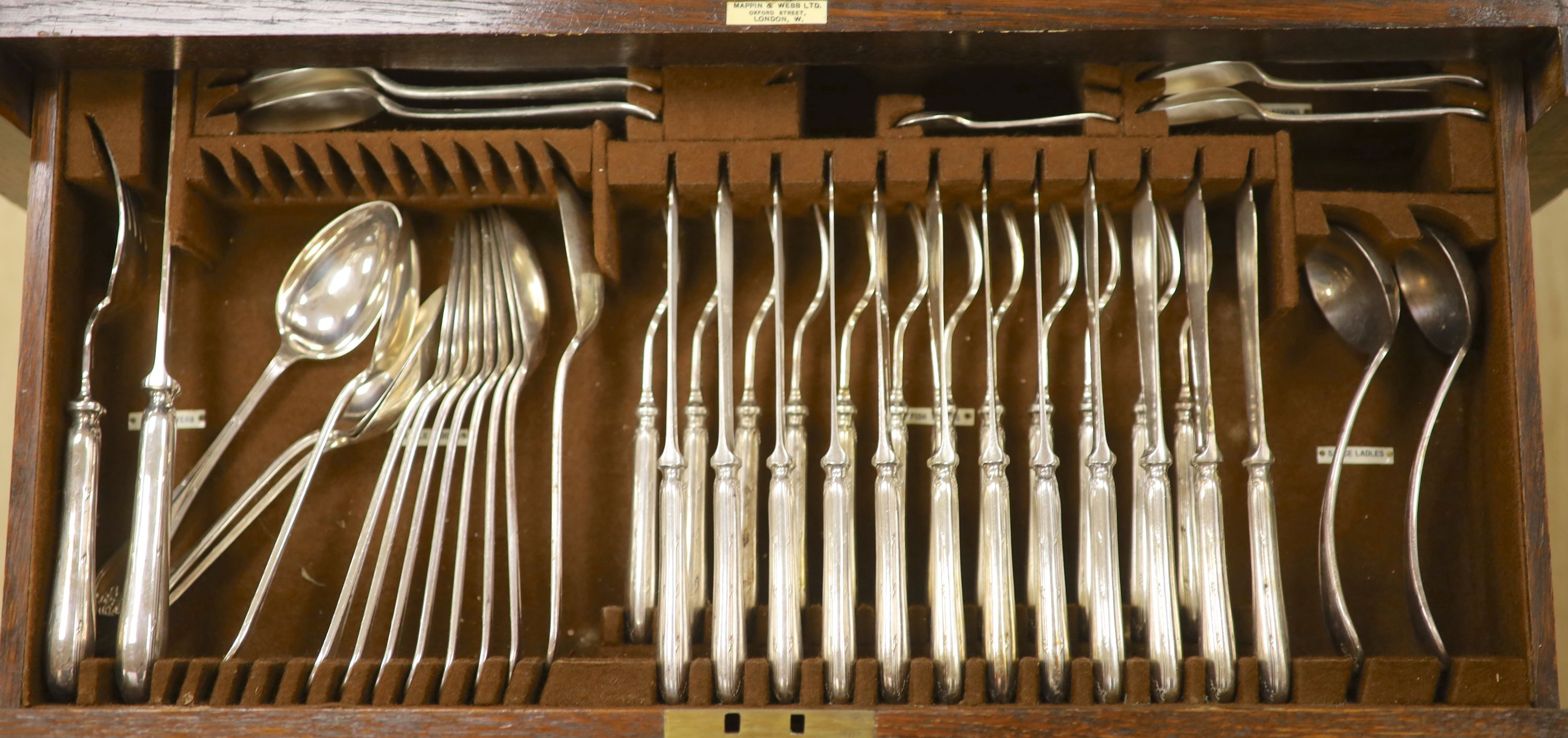 An early 20th century silver plated oak cased canteen (not complete)